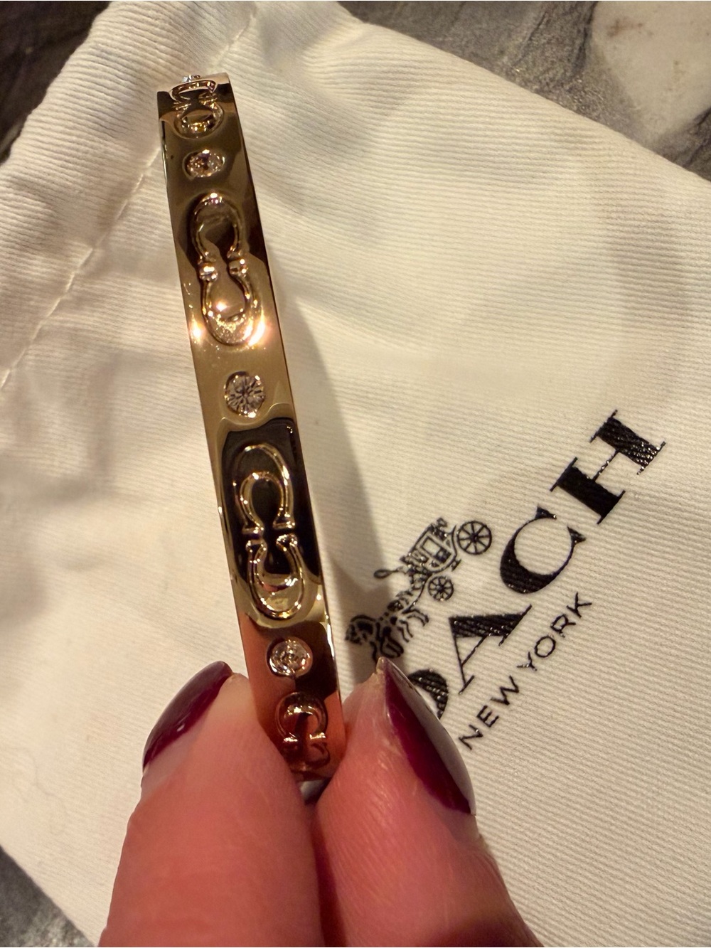 Coach Gold-Tone Signature Logo Crystal Bangle Bracelet - Picture 5 of 9